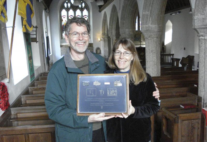 Chris and Sandy Boothe, with the plaque