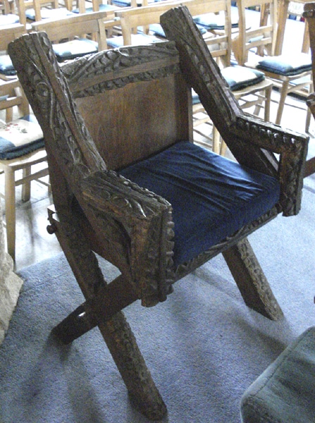A chair made from roof beams of the original church
